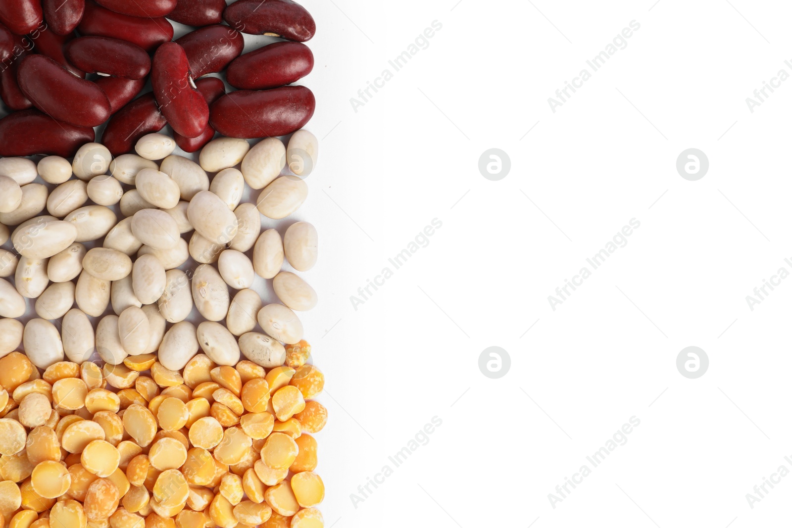 Photo of Different types of legumes isolated on white, top view