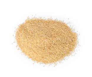 Photo of Pile of raw wheat groats isolated on white, above view