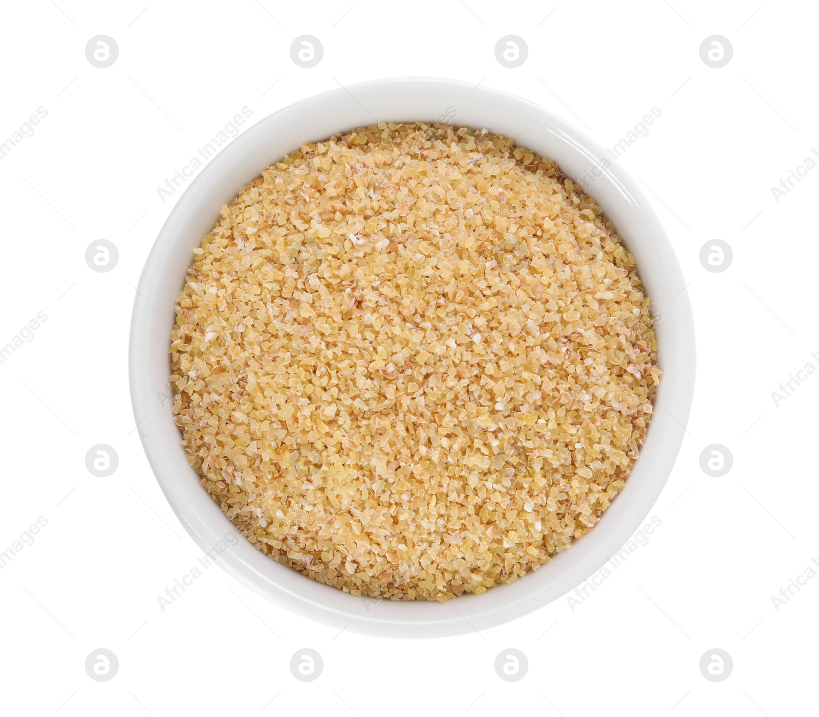 Photo of Raw wheat groats in bowl isolated on white, top view