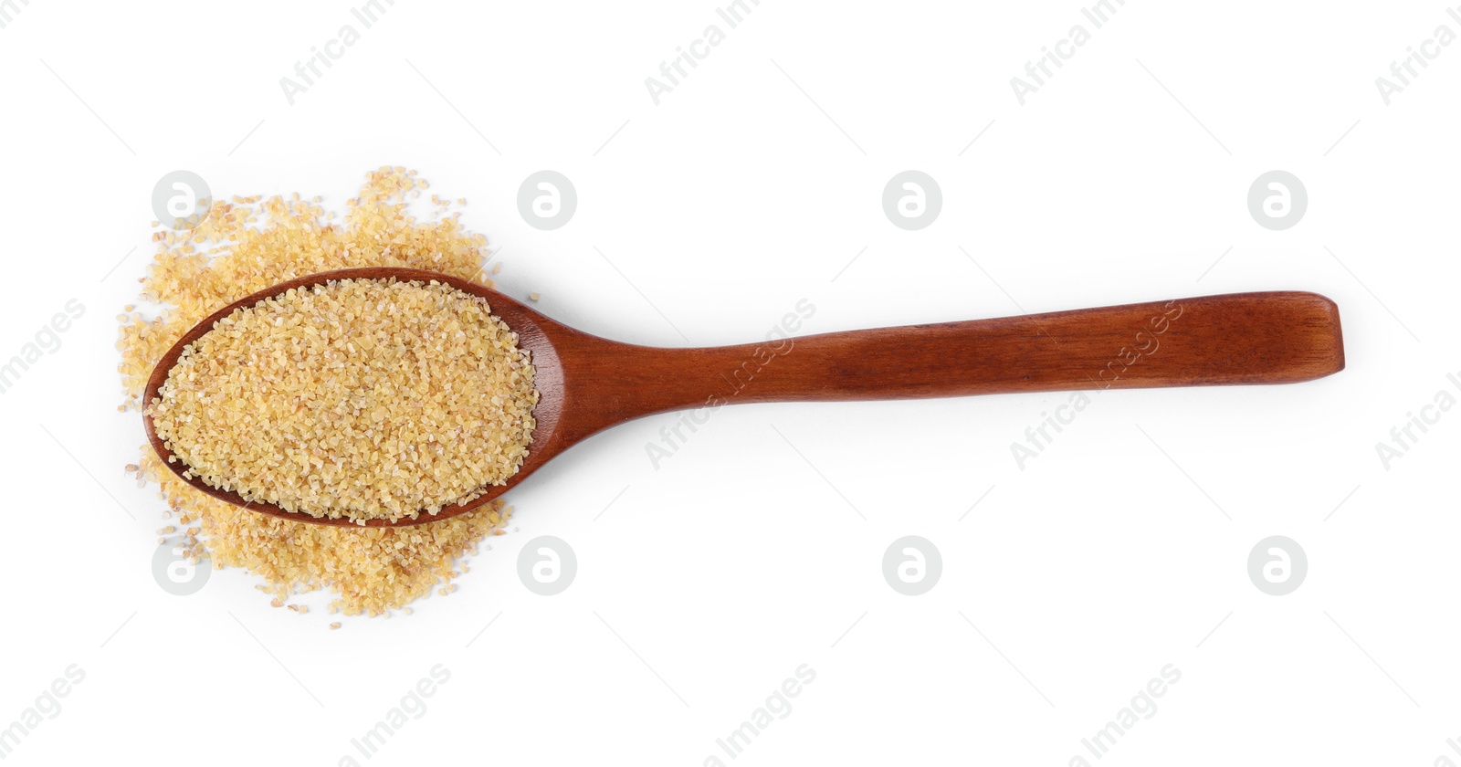 Photo of Spoon with raw wheat groats isolated on white, top view