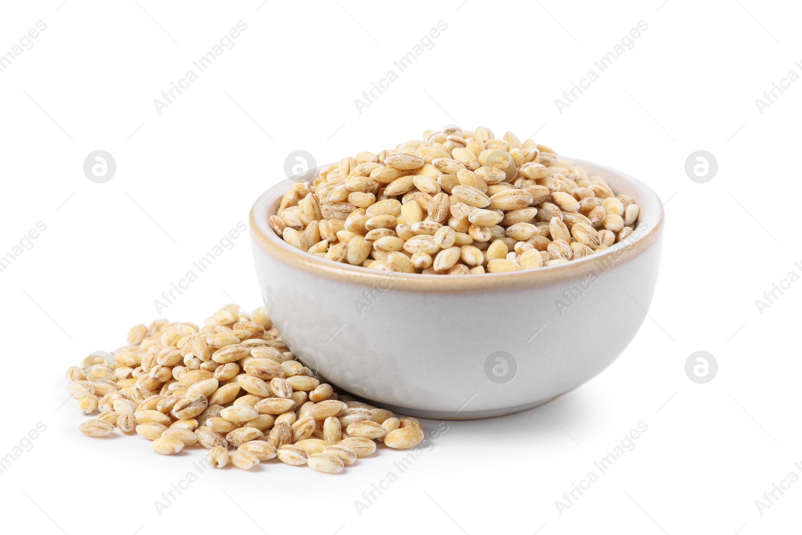 Photo of Pearl barley groats in bowl isolated on white