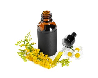 Photo of Bottle of tincture and flowers isolated on white