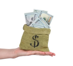 Photo of Woman with bag of dollar banknotes against light background, closeup