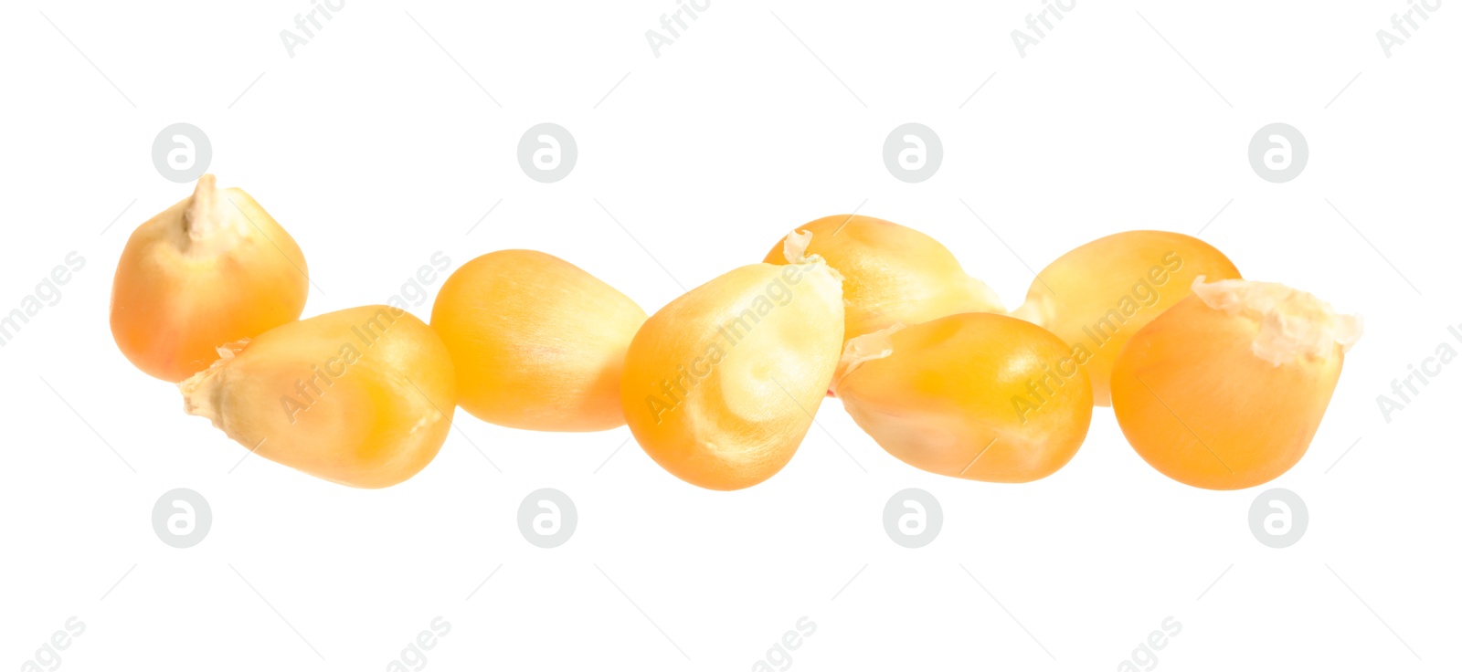 Photo of Pile of fresh corn kernels isolated on white