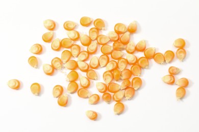 Pile of fresh corn kernels isolated on white, top view