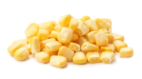 Photo of Pile of fresh corn kernels isolated on white