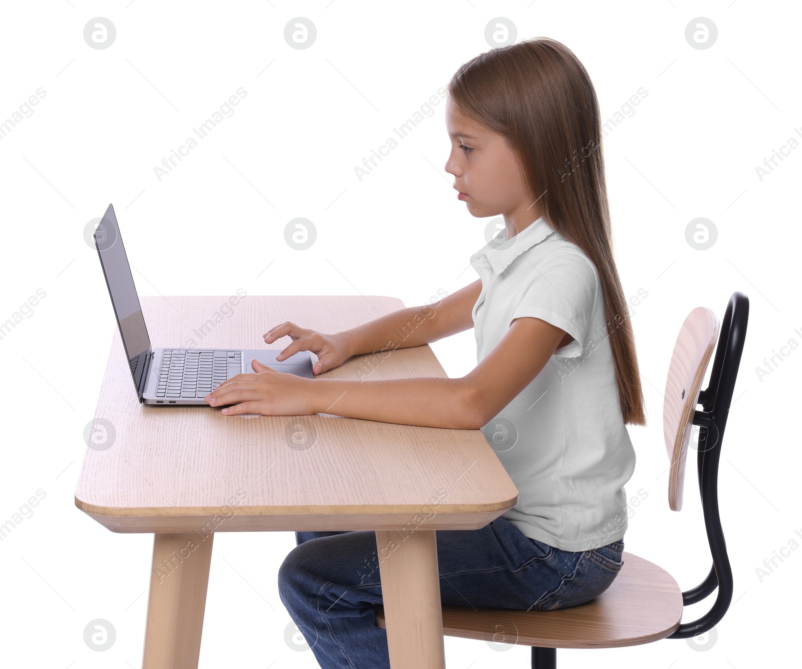 Photo of Girl with correct posture using laptop at wooden desk on white background