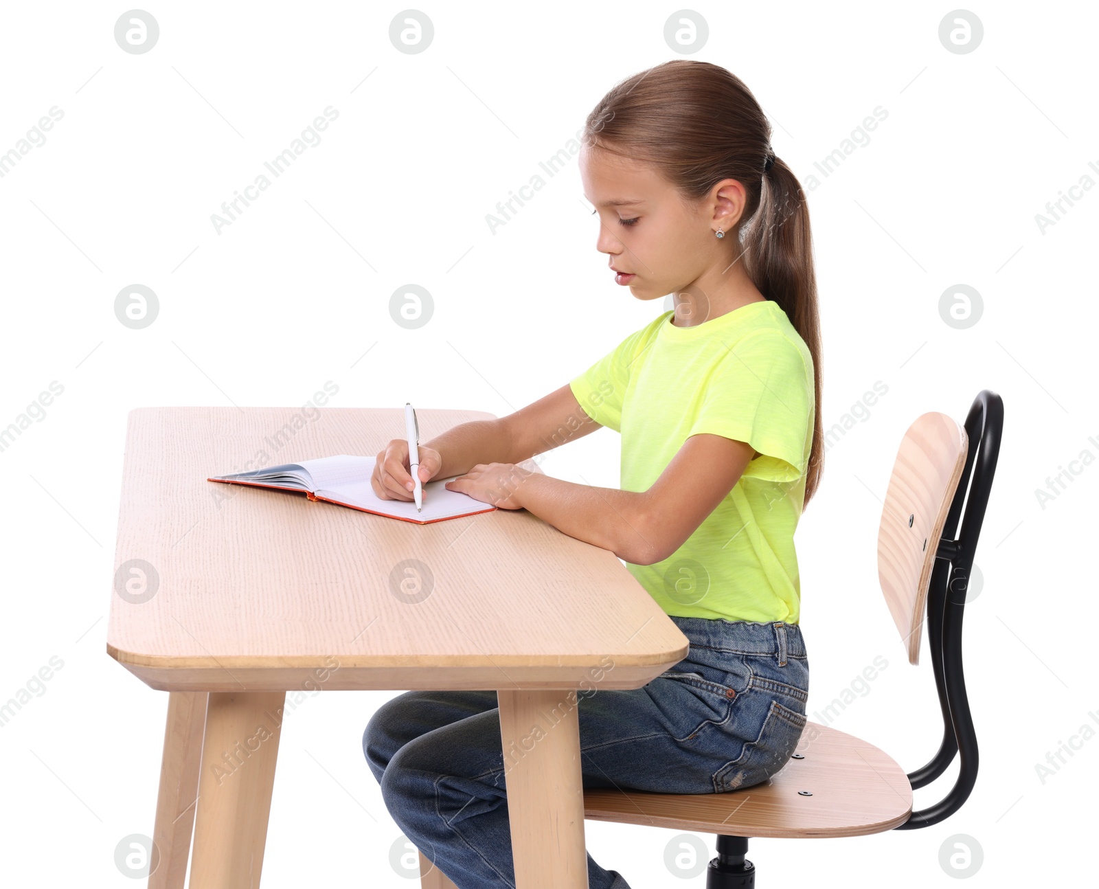 Photo of Girl with correct posture and notebook sitting at wooden desk on white background