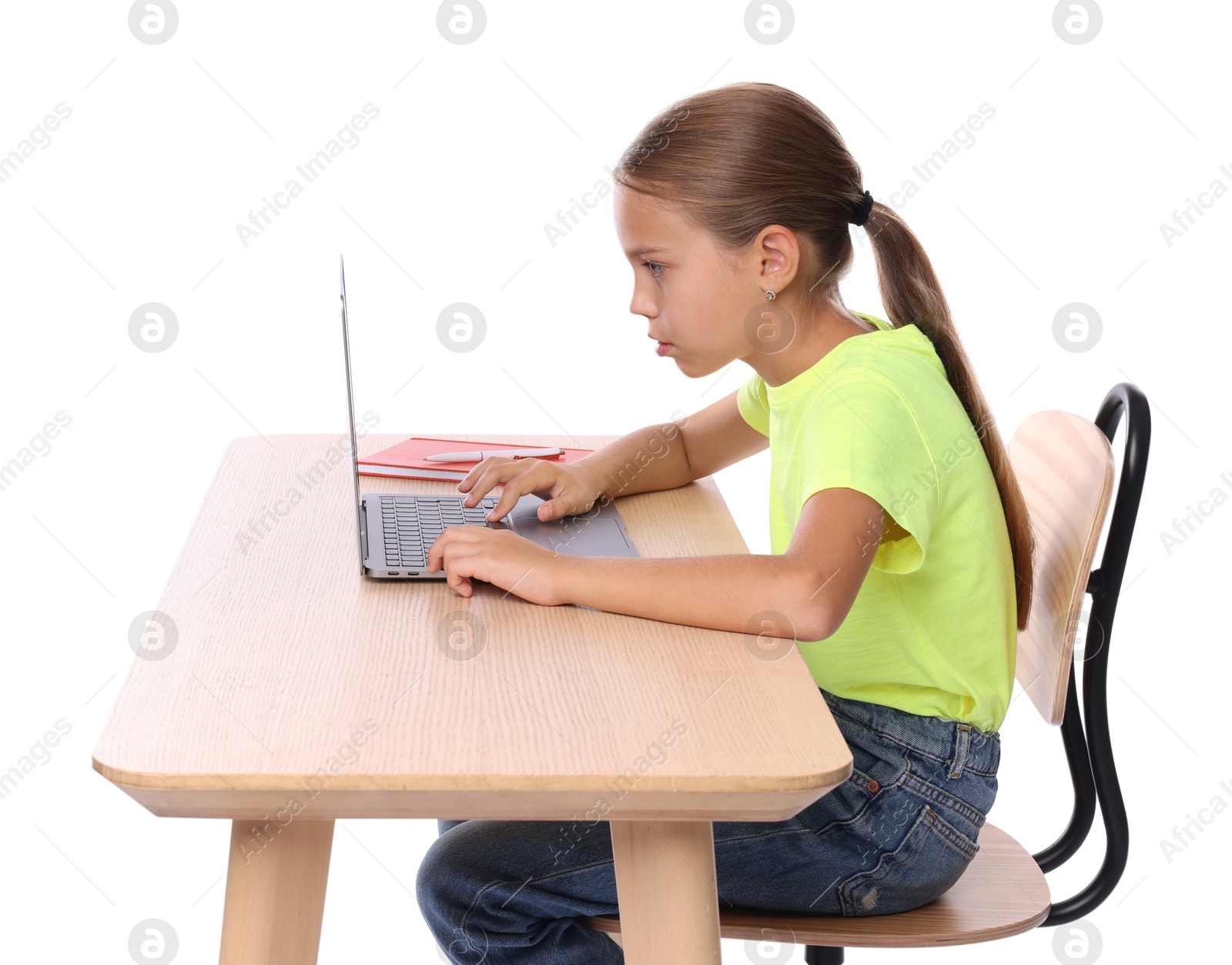 Photo of Girl with incorrect posture using laptop at wooden desk on white background