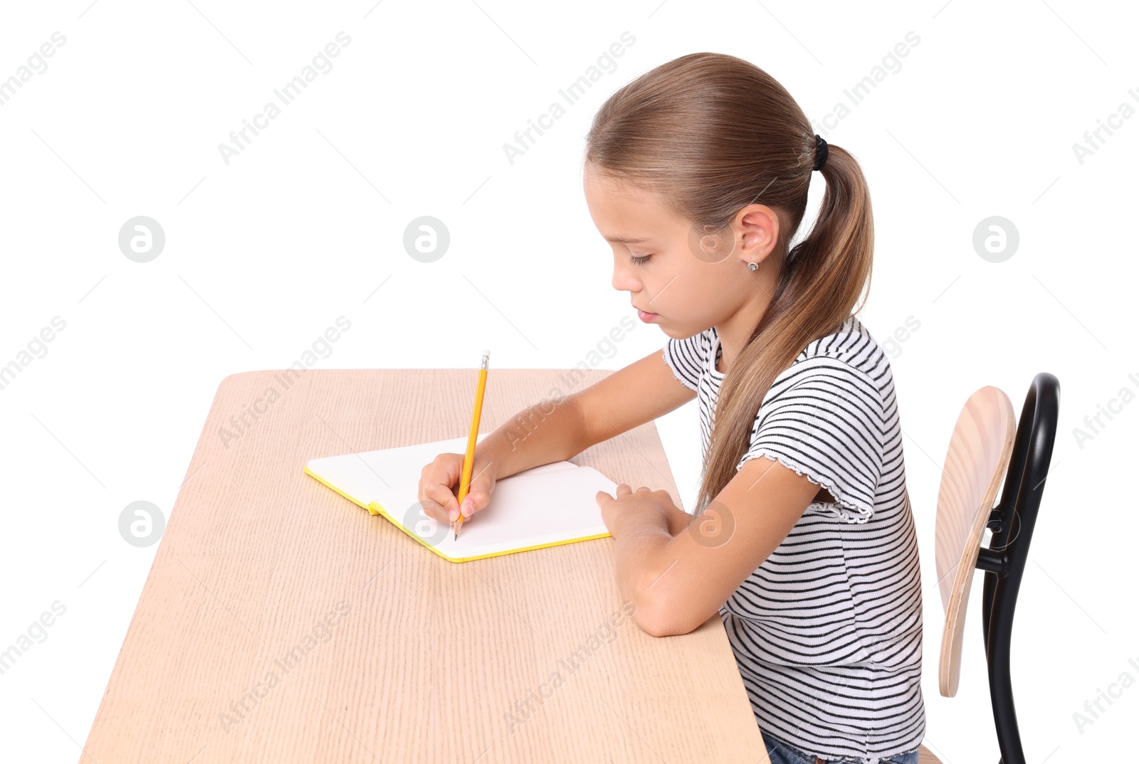 Photo of Girl with correct posture and notebook sitting at wooden desk on white background