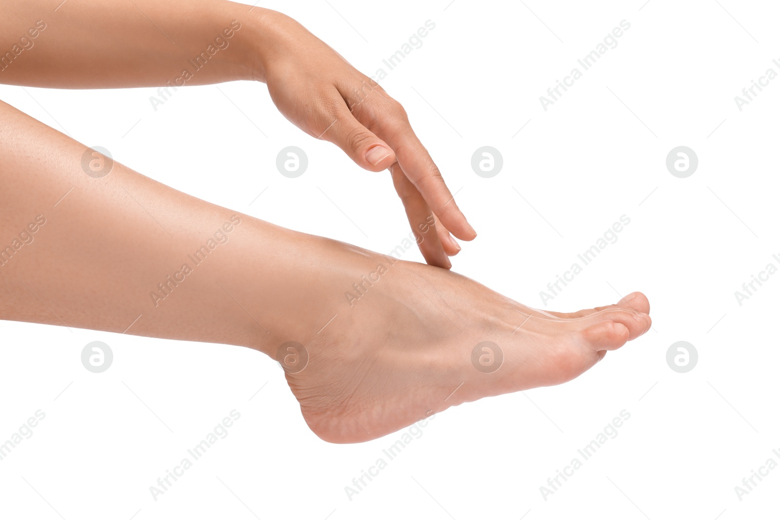 Photo of Woman touching her smooth feet on white background, closeup