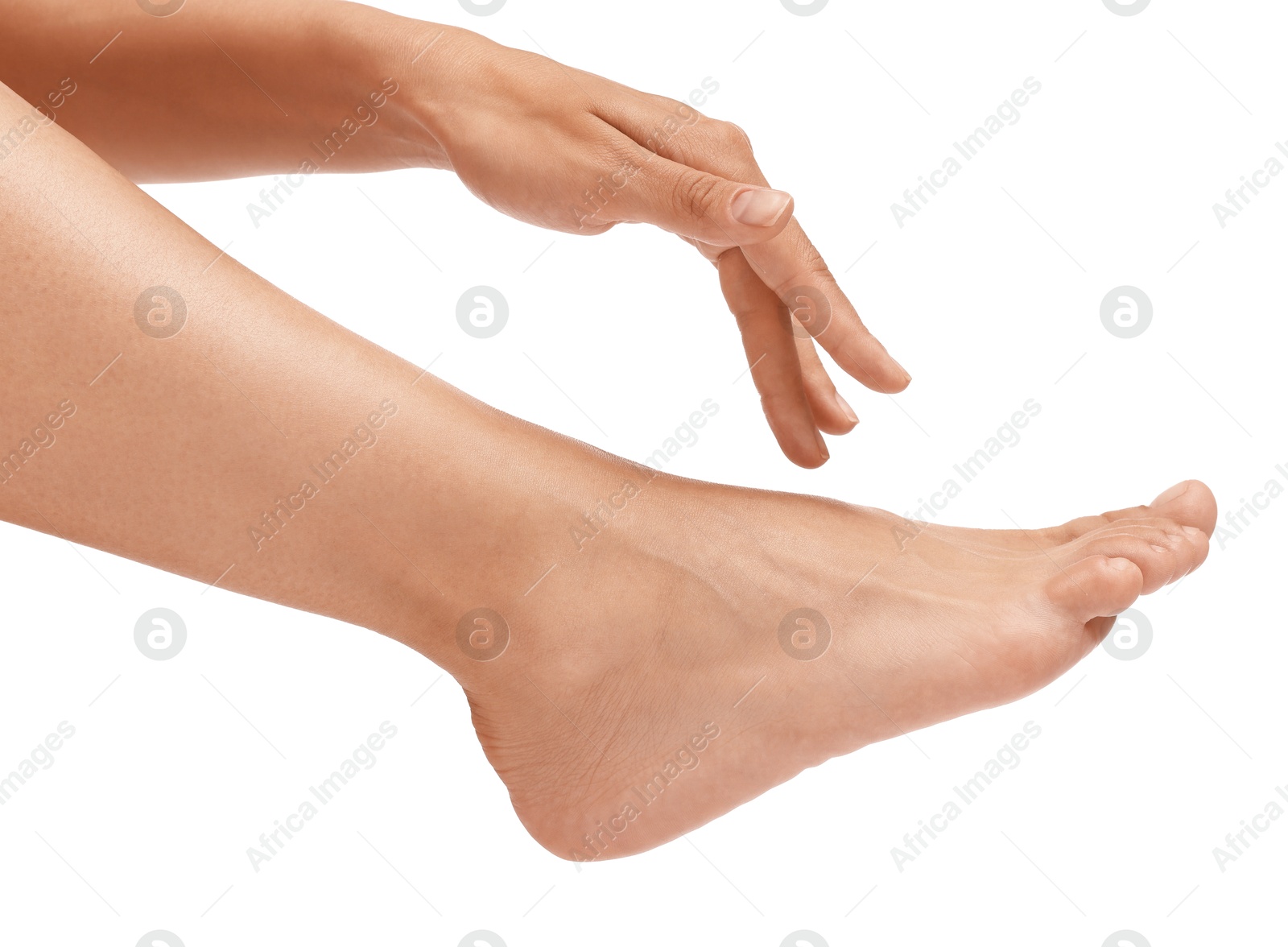 Photo of Woman touching her smooth feet on white background, closeup