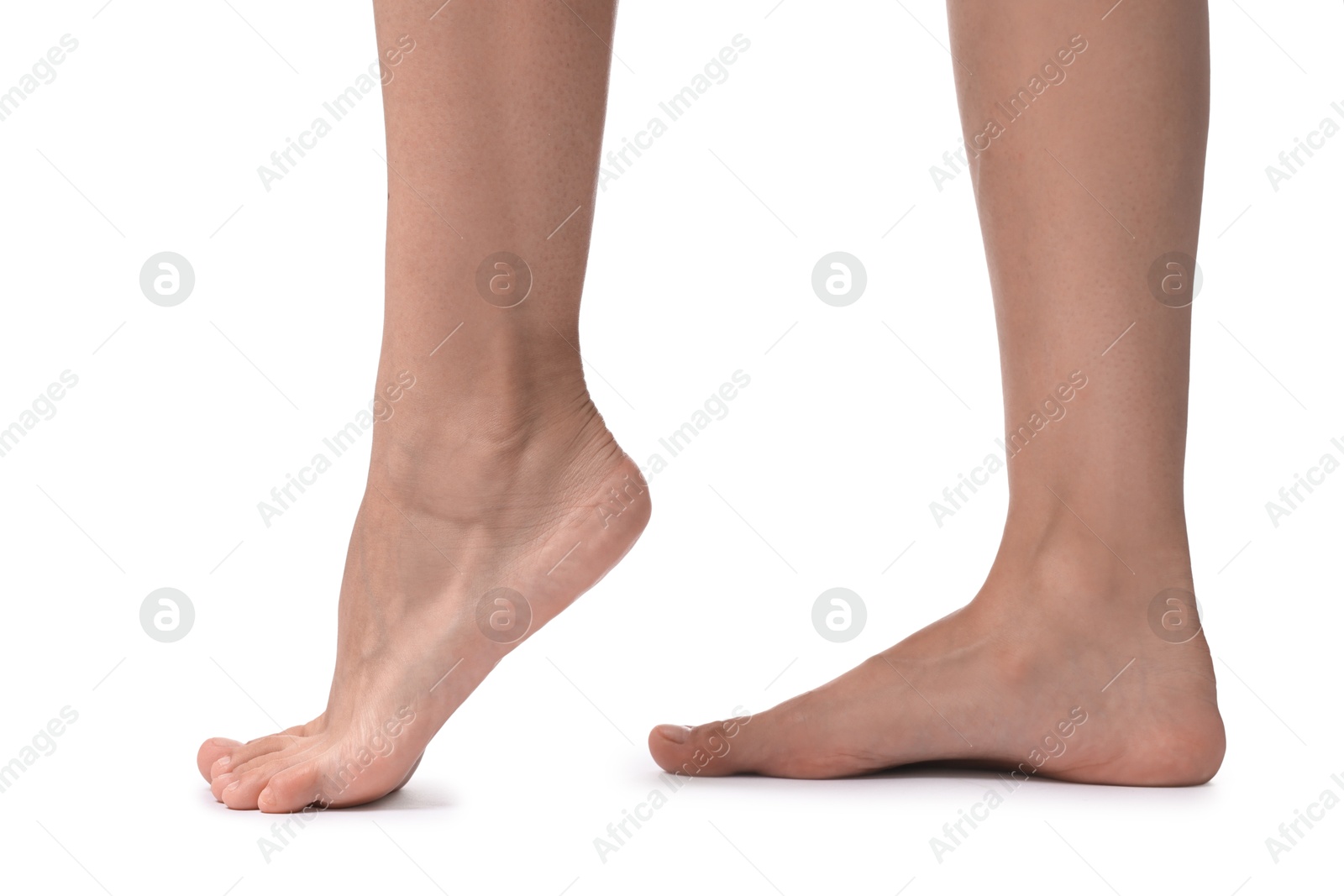 Woman with smooth feet on white background, closeup Photo of Woman with smooth feet on white background, closeup