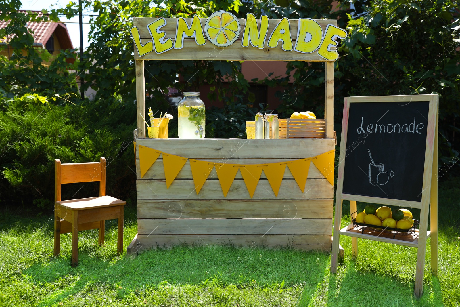 Photo of Lemonade stand with refreshing drink in park