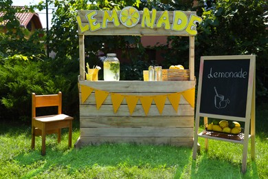 Lemonade stand with refreshing drink in park