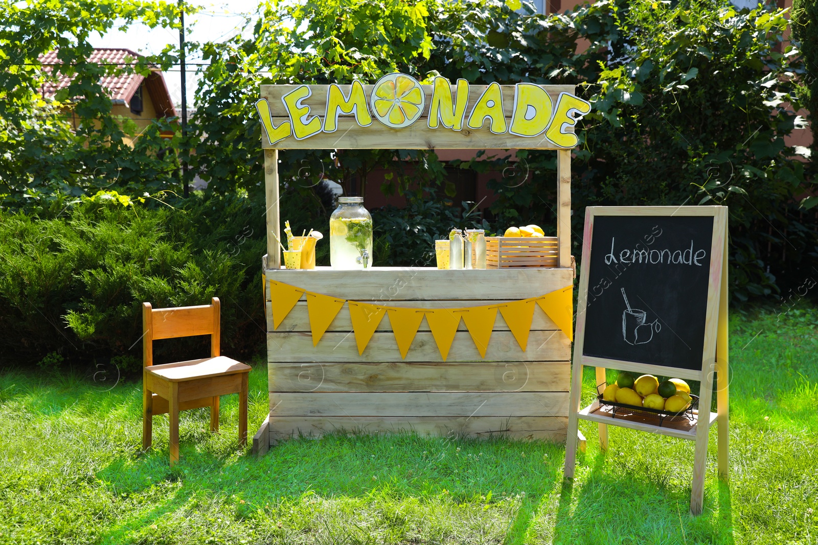 Photo of Lemonade stand with refreshing drink in park