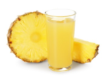 Photo of Glass with pineapple juice and pieces of fresh fruit isolated on white