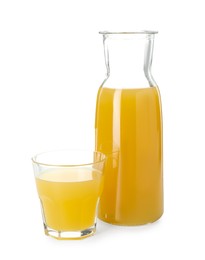 Photo of Glass and jug with tasty pineapple juice isolated on white