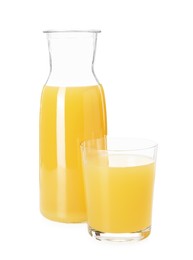 Photo of Glass and jug with tasty pineapple juice isolated on white