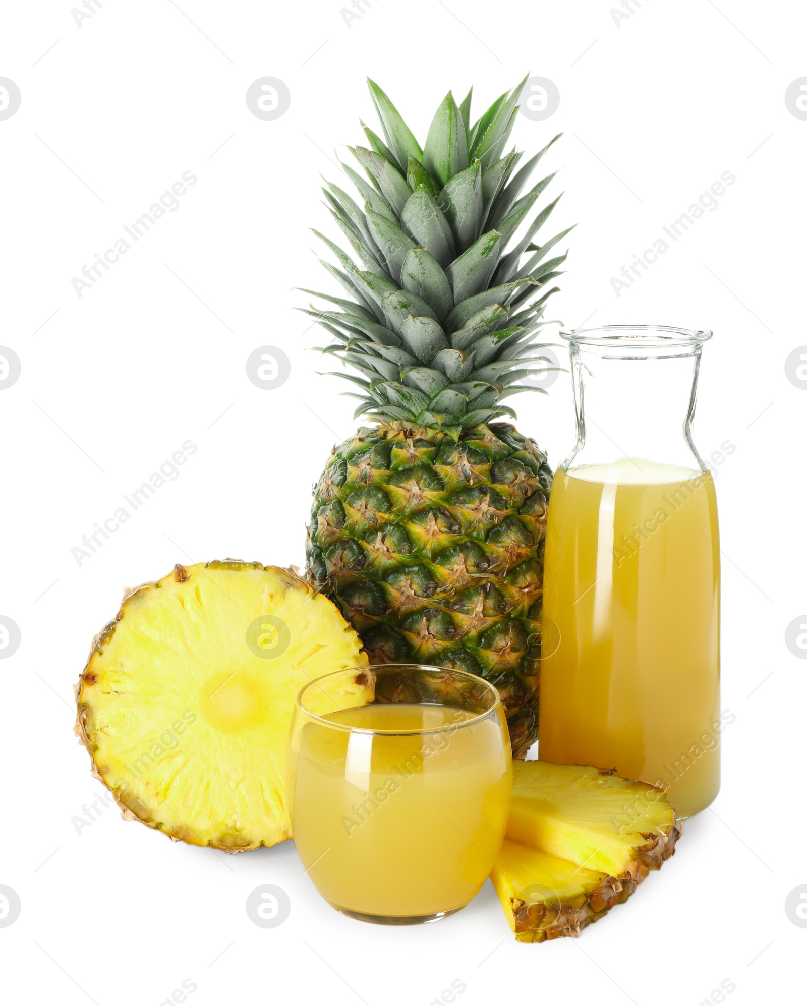 Photo of Glass with pineapple juice, jug and fresh pineapples isolated on white