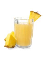 Photo of Glass with pineapple juice and pieces of fresh fruit isolated on white