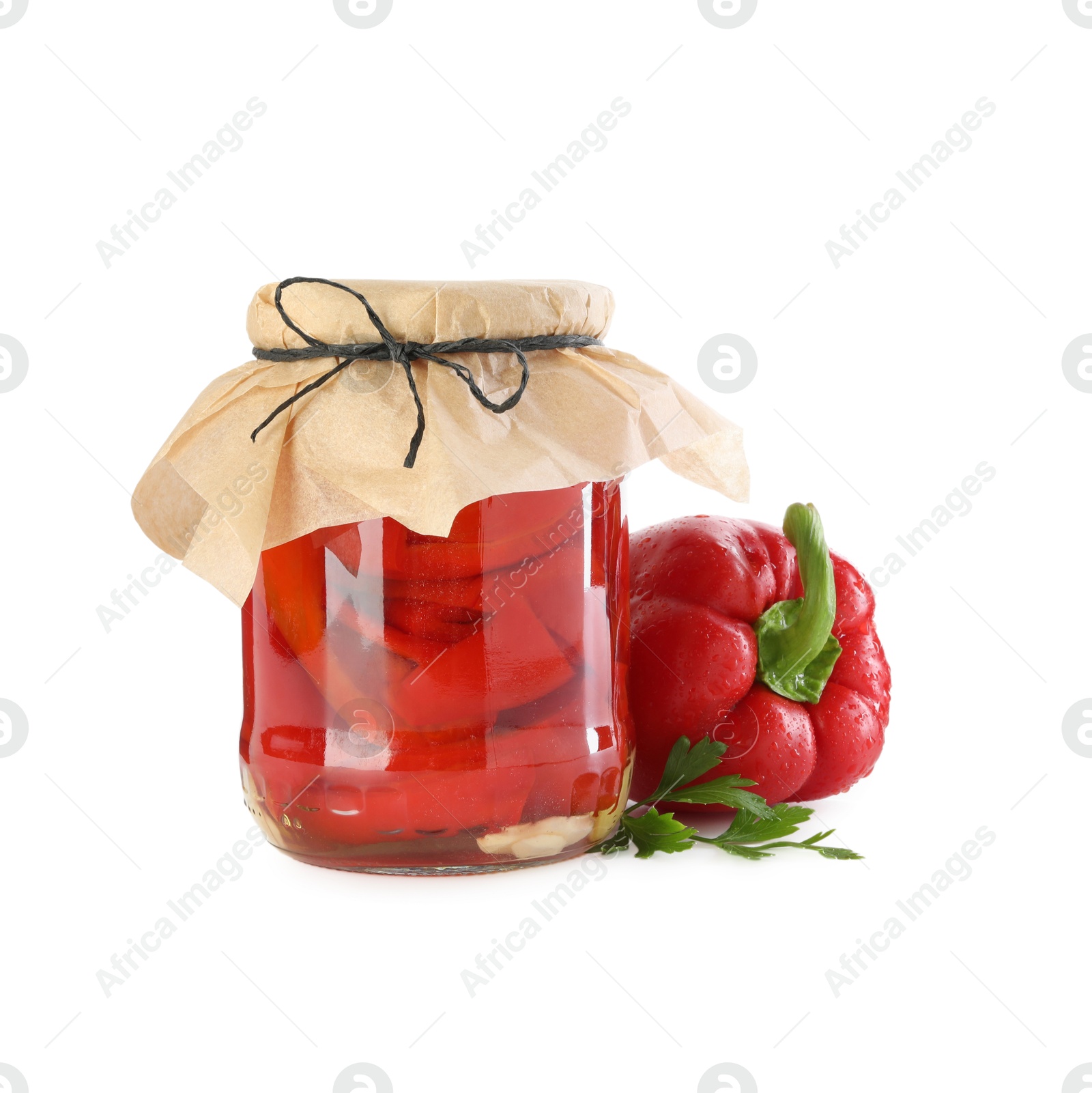 Photo of Tasty pickled bell peppers in jar and fresh ingredients isolated on white