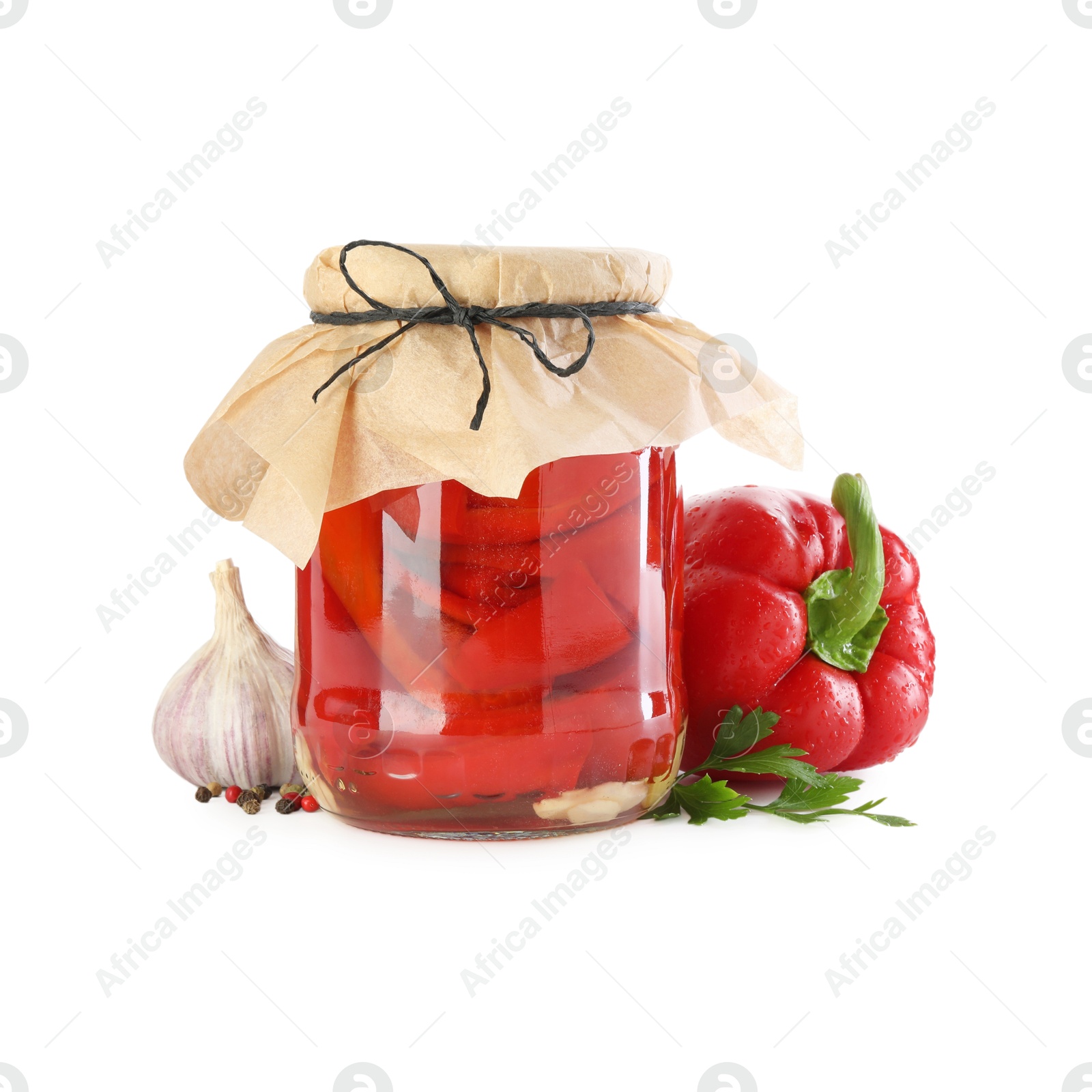 Photo of Tasty pickled bell peppers in jar and fresh ingredients isolated on white