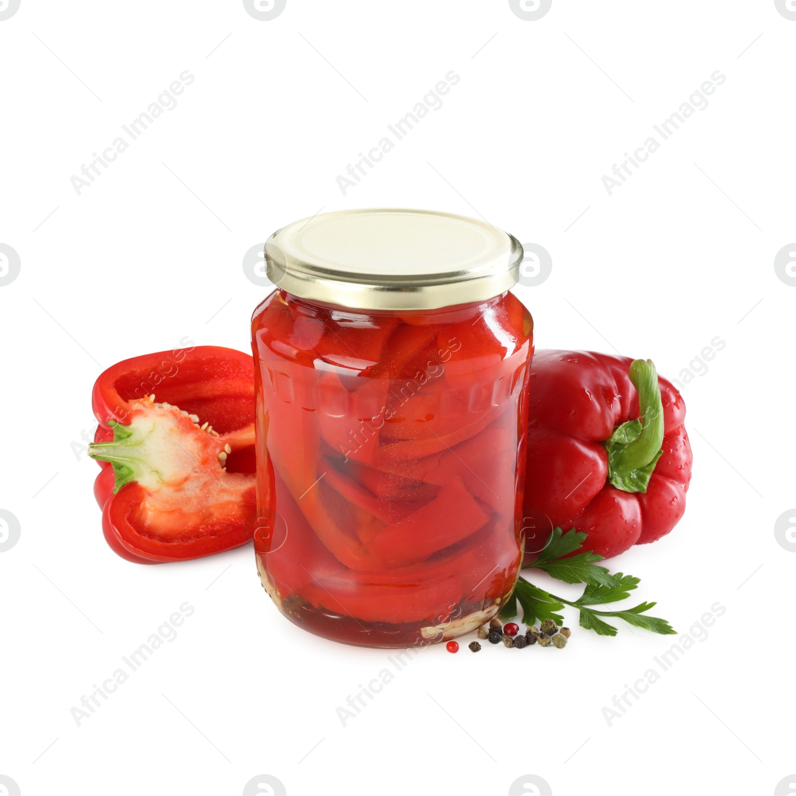 Photo of Tasty pickled bell peppers in jar and fresh ingredients isolated on white