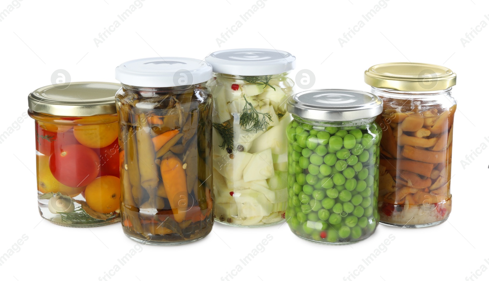 Photo of Different pickled products in jars isolated on white