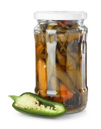 Photo of Tasty pickled jalapeno peppers in jar and fresh vegetable isolated on white