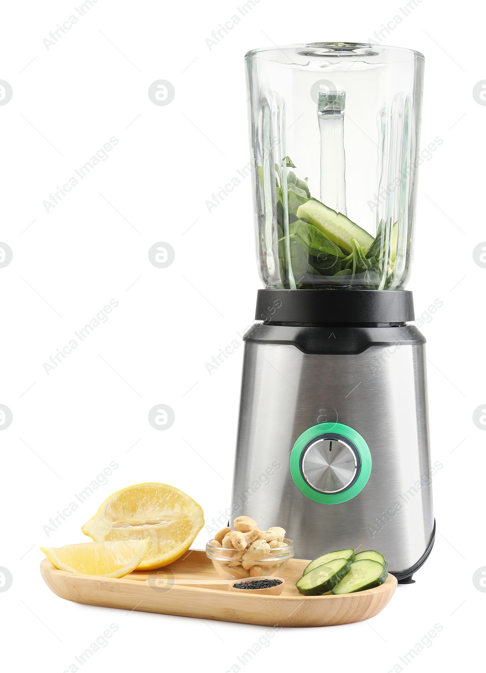 Photo of Modern blender with ingredients for smoothie isolated on white