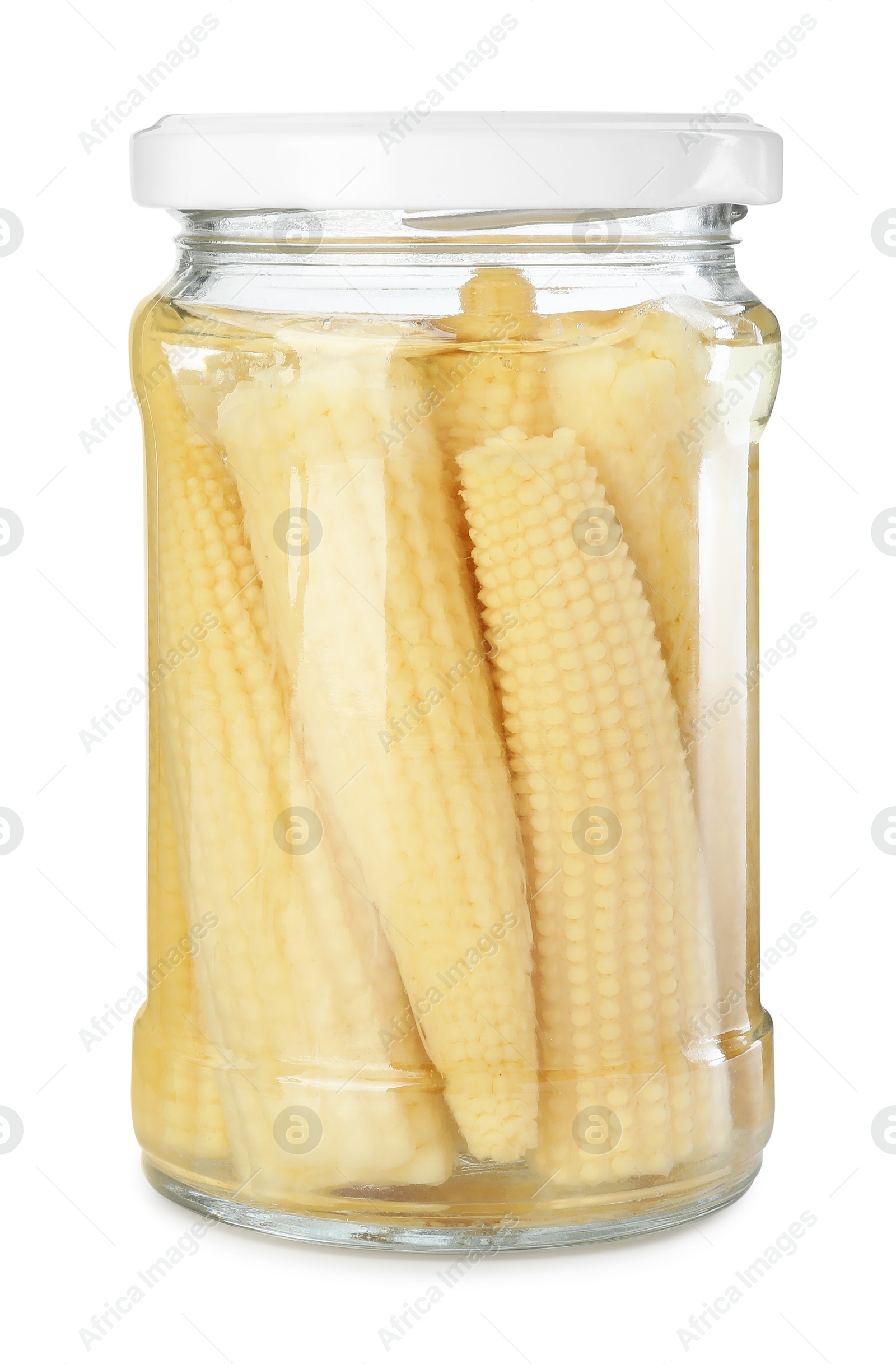 Photo of Tasty pickled yellow baby corns in jar isolated on white