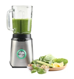 Photo of Modern blender with smoothie and ingredients isolated on white