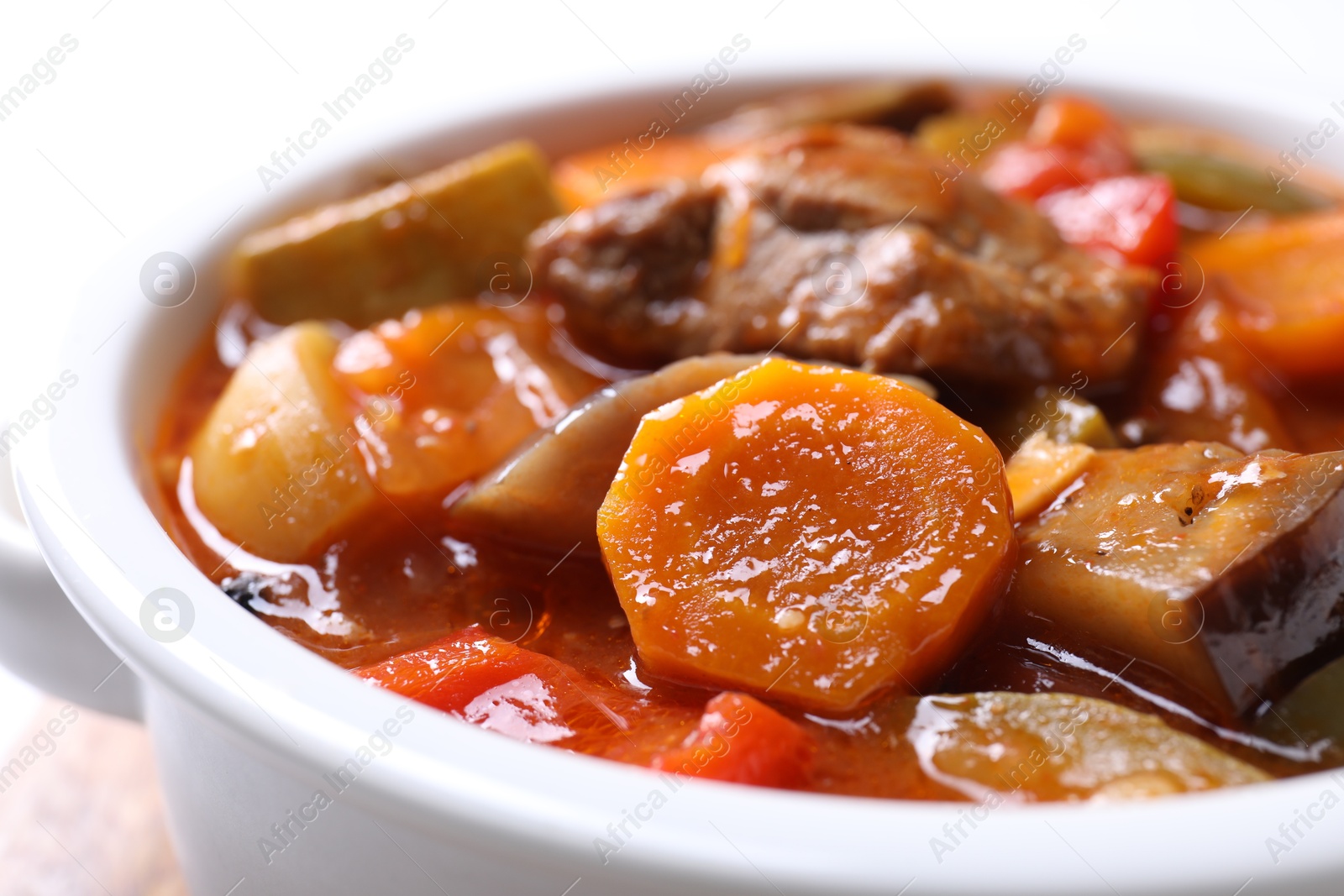 Photo of Delicious stew with vegetables in bowl, closeup