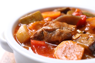 Delicious stew with vegetables in bowl, closeup