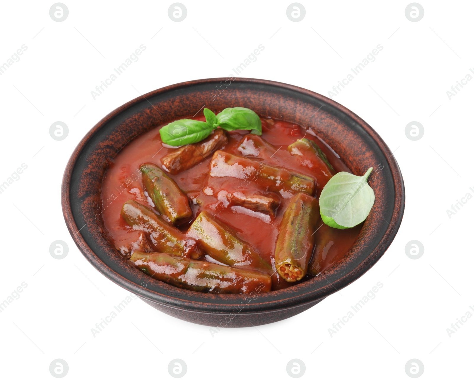 Photo of Tasty stew with okra, tomato sauce and basil isolated on white