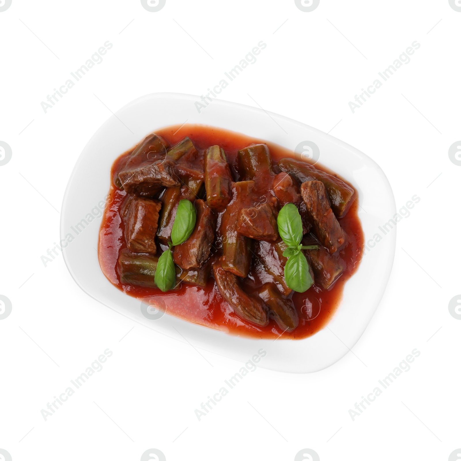 Photo of Tasty stew with okra, tomato sauce and basil isolated on white, top view