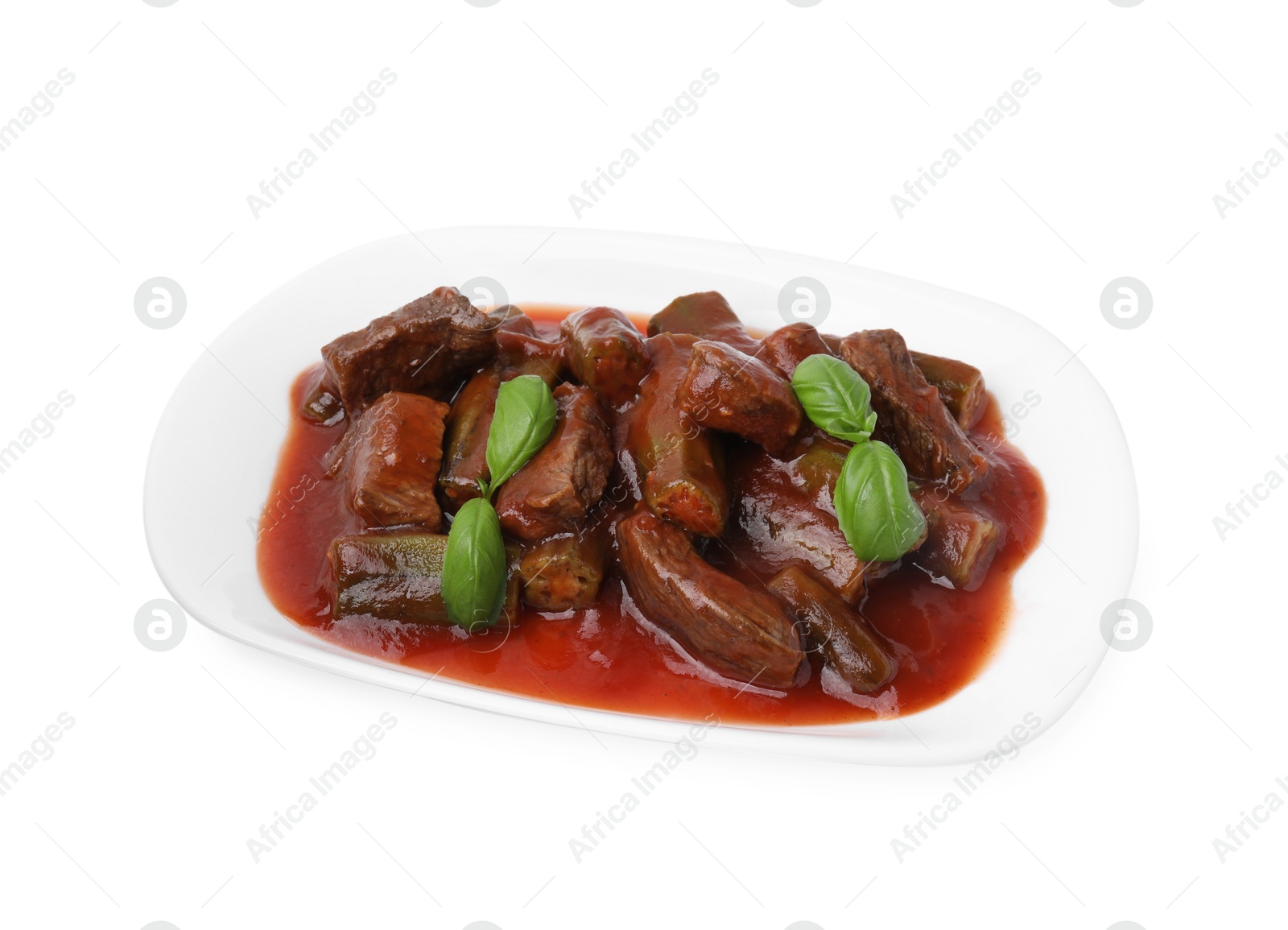 Photo of Tasty stew with okra, tomato sauce and basil isolated on white