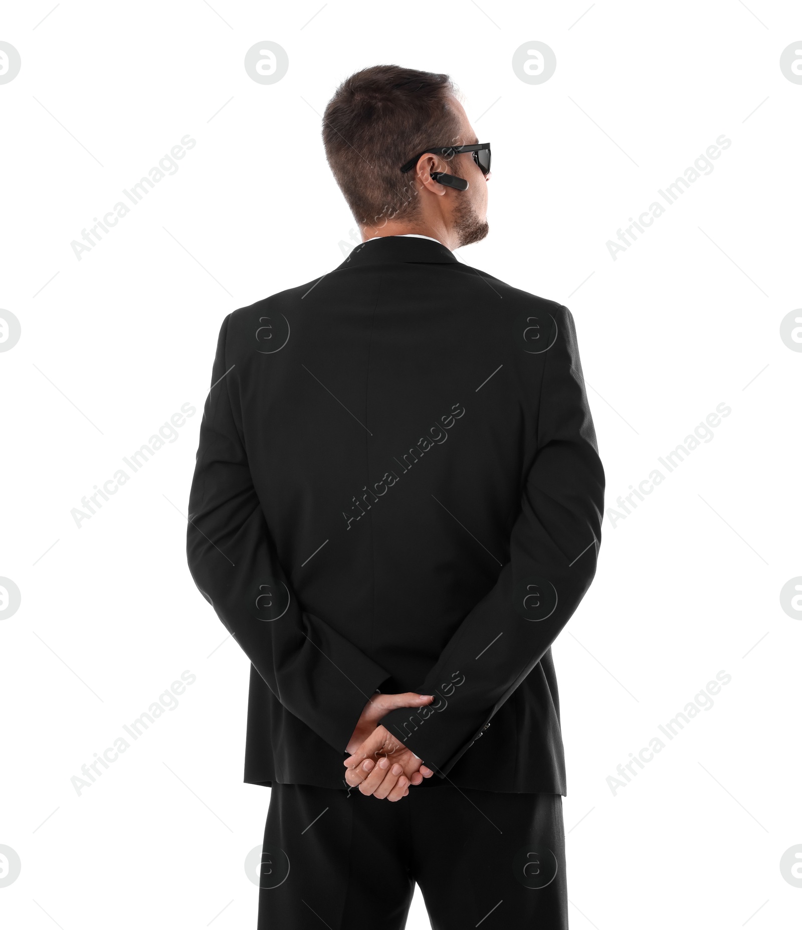 Photo of Bodyguard in suit isolated on white, back view