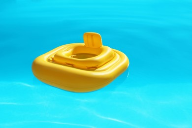 Yellow float in swimming pool at luxury resort