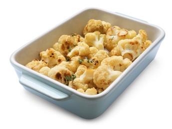 Baked cauliflower in baking dish on white background