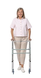 Photo of Senior woman using walking frame on white background