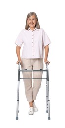 Photo of Senior woman using walking frame on white background