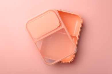 Photo of Empty lunch box on pink background, top view