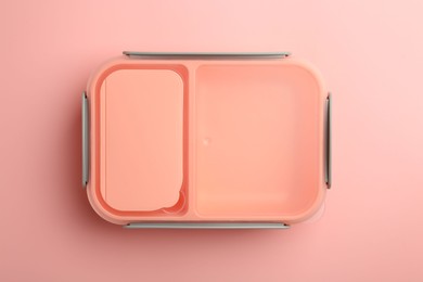 Photo of Empty lunch box on pink background, top view