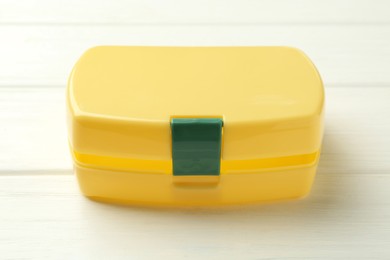 Photo of Empty lunch box on white wooden table