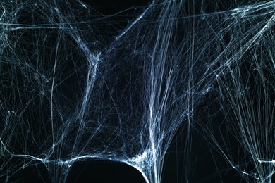 Image of Cobweb against black background, toned in gradient blue color