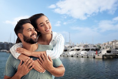 Happy couple enjoying their honeymoon. Newlyweds during wedding trip