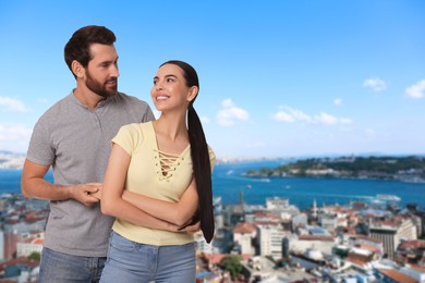 Image of Happy couple enjoying their honeymoon. Newlyweds during wedding trip