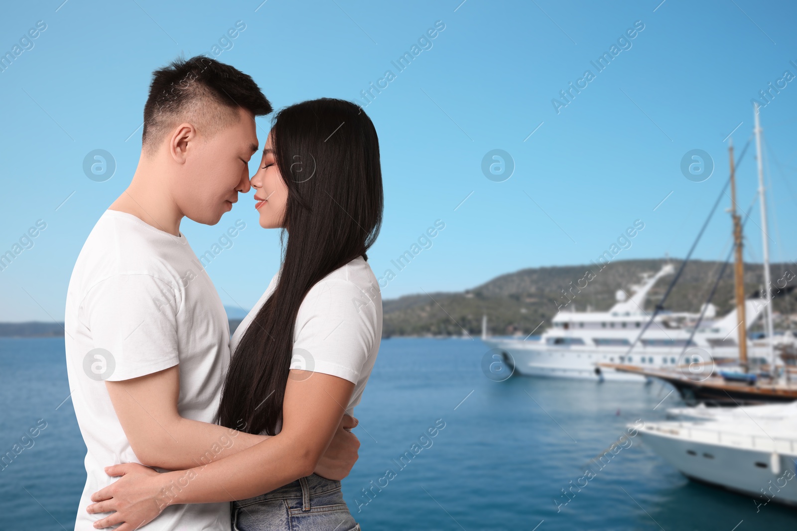 Image of Happy couple enjoying their honeymoon. Newlyweds during wedding trip